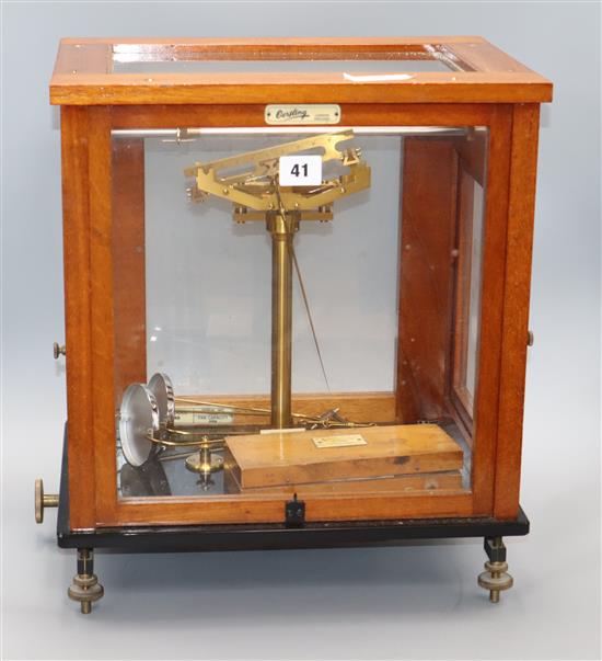 A mahogany cased beam scales and various cased weights